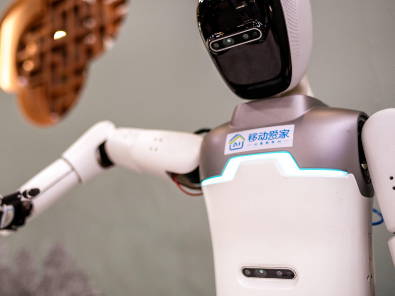 3A0KYTT Barcelona, Spain. 4th Mar, 2025. A robot is presented at the China Mobile Ltd booth during the Mobile World Congress 2025 in Barcelona, one of the most important events for mobile technologies and a launching pad for smartphones, future technologies, devices, and peripherals. Credit: Matthias Oesterle/Alamy Live News