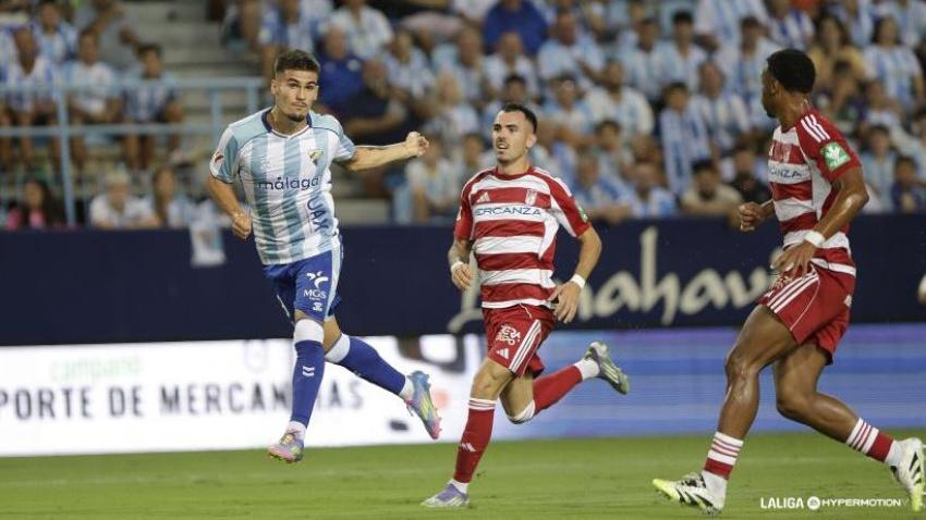 Chupe anota el primer gol ante el Granada de cabeza.