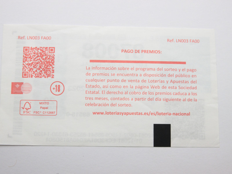 Imagen del reverso de un billete de Lotería Nacional de España correspondiente al sorteo de Navidad impreso in situ por la máquina expendedora