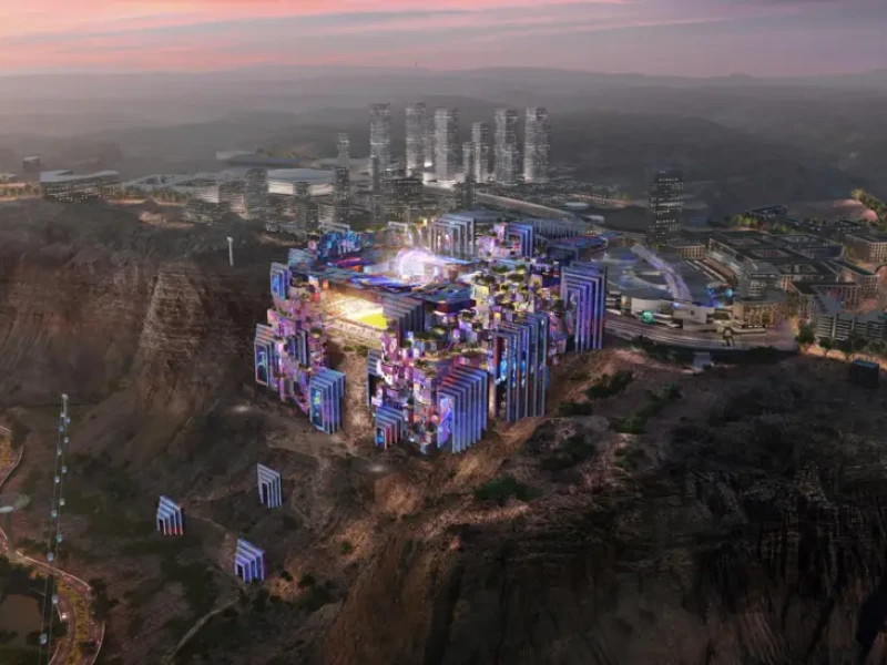 Futurista, rodeado de luces y paneles led y construido sobre un acantilado.