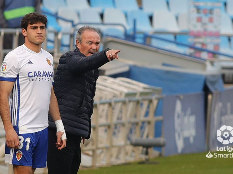 JIM junto a Iván Azón, en una Romareda sin público.