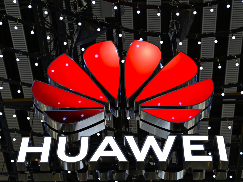 FILED - 04 March 2025, Spain, Barcelona: The logo of the Chinese technology group Huawei hangs from the ceiling of a hall at the Mobile World Congress (MWC) mobile communications trade fair. Photo: Wolf von Dewitz/dpa