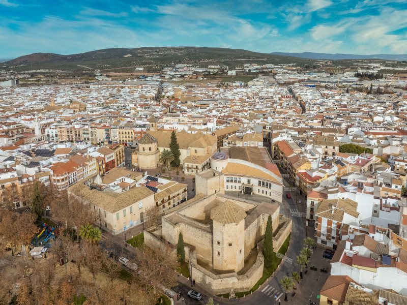 2S9JNFE Aerial view of Lucena medieval castle with Damas tower in the middle of the town in Spain