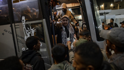 A bus carrying Palestinian patients arrives at Nasser Hospital in Khan Younis, southern Gaza Strip