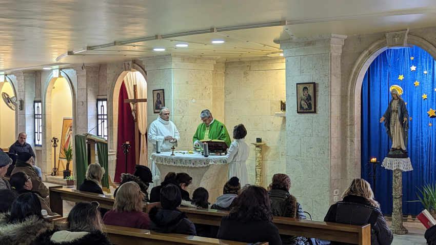 Fr. Hugo Fabian Alaniz celebrating Sunday mass with the faithful at Our Lady of Annunciation parish in Aleppo - after the earthquake
