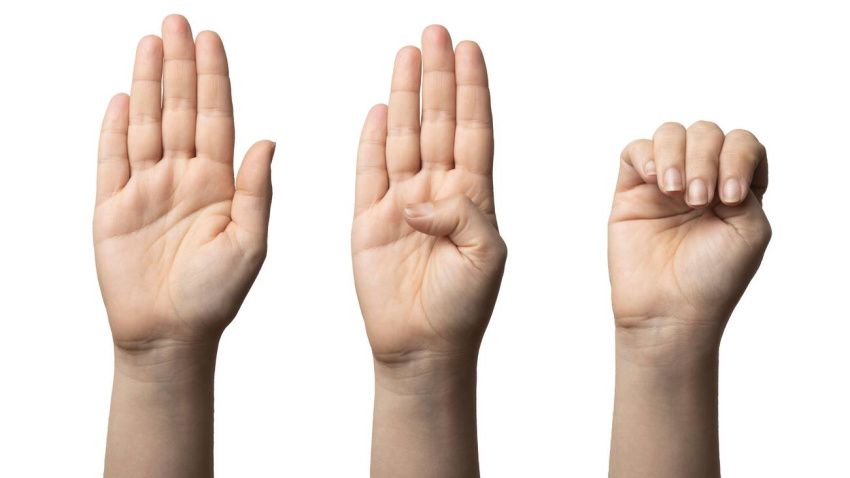 2H5FMJ5 2H5FMJ5 Signal for help: woman shows how to make hand gesture to ask for help silently