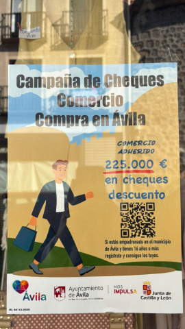 Cartel sobre la campaña de Cheques Comercio Compra en Ávila