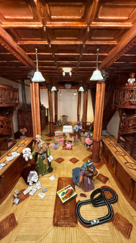 Diorama de los Reyes Magos recogiendo los juguetes en Las Tres Campanas