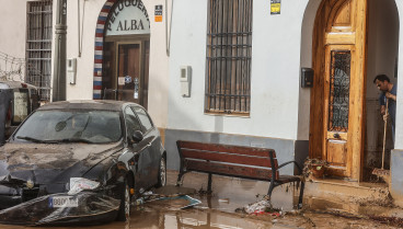 Coche destrozado por la Dana