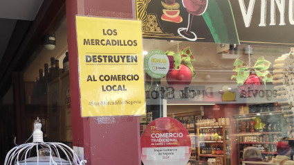 Cartel en los comercios