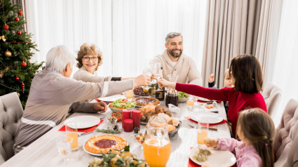 R4FYAW Family Enjoying Christmas Dinner