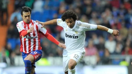 Miguel de las Cuevas disputa un balón con Marcelo en el Bernabéu