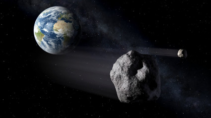 Asteroide, con la Tierra al fondo