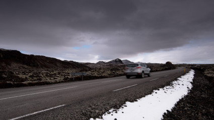 2J0G81T Car driving highway road in Iceland countryside in winter.