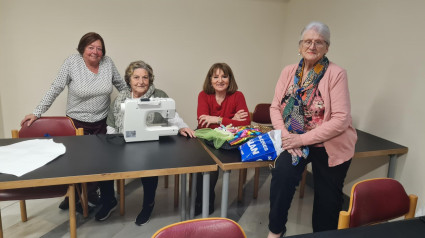 Casilda, Carmen, Hortensia y Mari Cruz en el centro social Campomanes de Oviedo