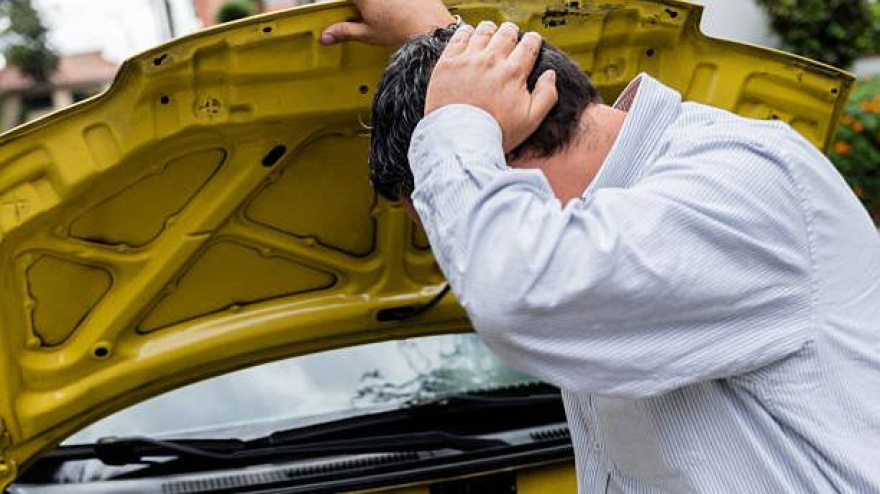 Frustrated man with a car breakdow