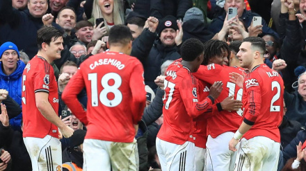 Los jugadores del United celebran la victoria contra el Manchester City
