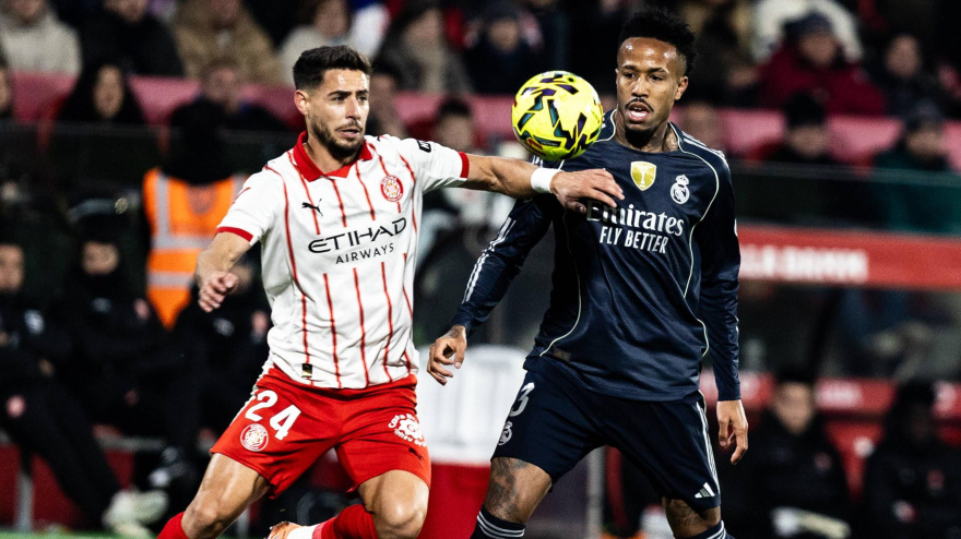 November 30, 2025, Barcelona, Barcelona, Spain: Alex Moreno (L) of Girona FC and Eder Militao (R) of Real Madrid CF seen in action during LALIGA EA SPORTS round 14 match between Girona FC and Real Madrid CF at Estadi Montilivi (Credit Image: © Marti Segura Ramoneda/ZUMA Press Wire)