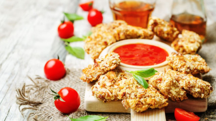Rodaballo en costra de almendras con tomate confitado