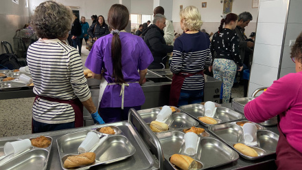 Voluntarios y usuarios del Comedor Social Virgen de la Cinta