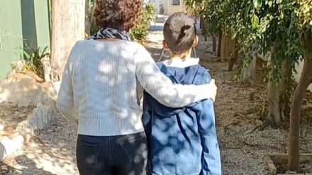 Amelia Uceda acompañando a su hijo Iván