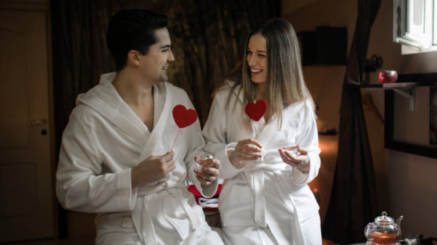 Young couple enjoying together at spa on valentine's da