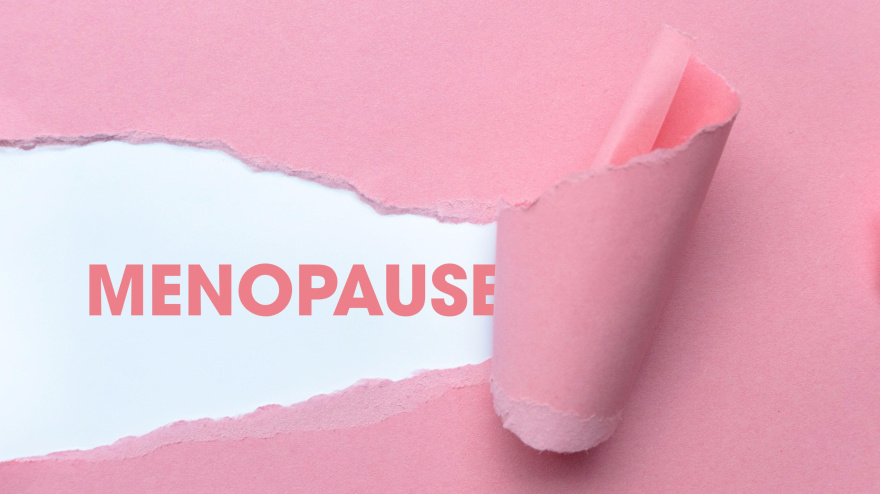 Papel rosa con la palabra «menopausia»
