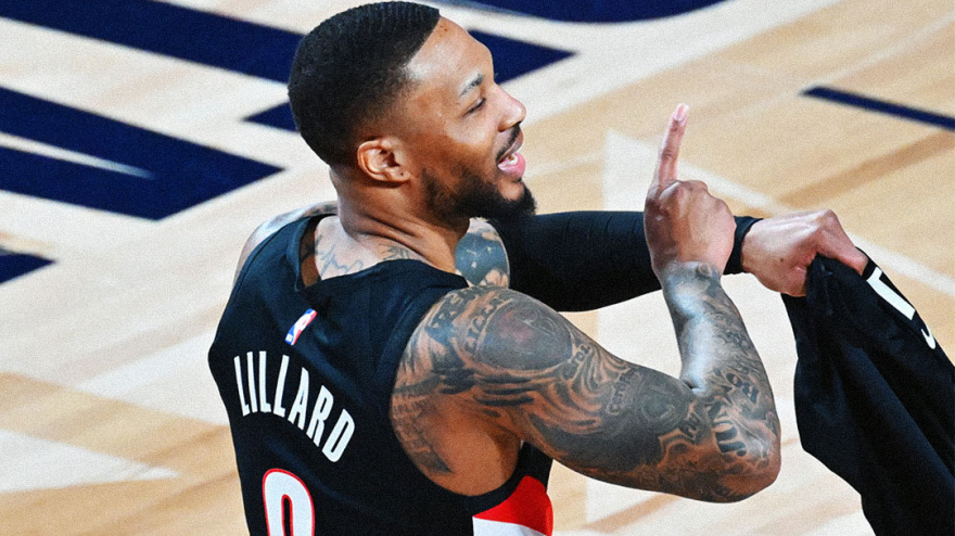 Damian Lillard celebra su victoria en el concurso de triples con su icónico gesto del reloj.