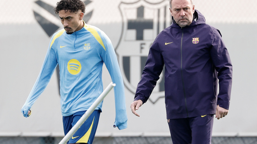 Raphinha y Hansi Flick