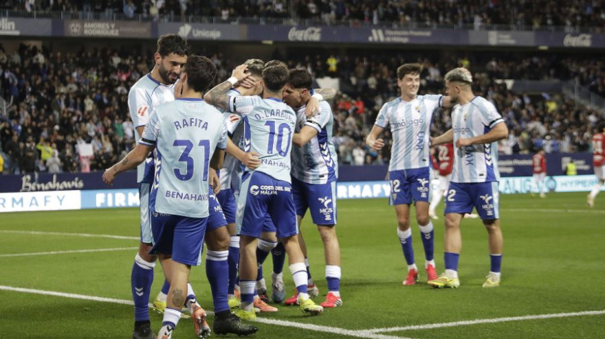 Los jugadores del Málaga celebrando el 1-0