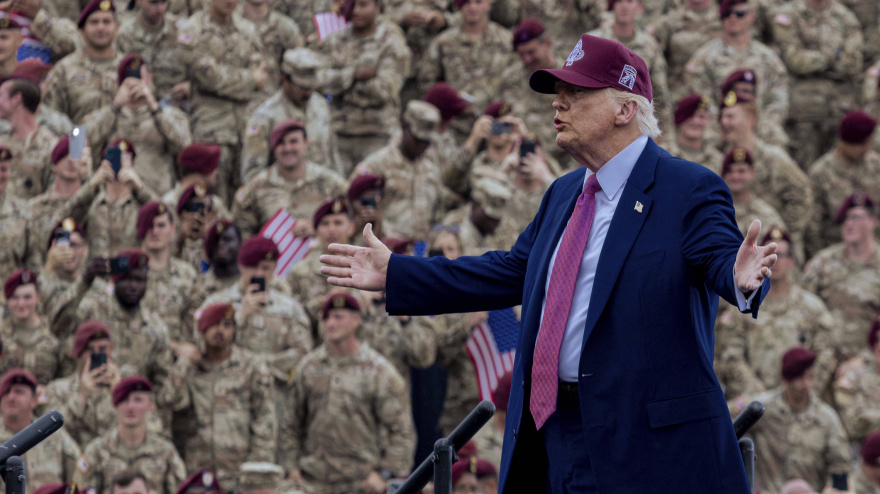 U.S. President Donald Trump gestures to the crowd before delivering remarks celebrating the Army 250 birthday at Fort Bragg Military Base, June 10, 2025 in Fort Bragg, North Carolina.