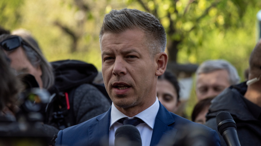 The President of the Tisza Party, Peter Magyar looks at the camera during his reply on his press conference in Budapest. The President of the Tisza Party, Peter Magyar - the biggest opposition of Viktor Orban and the Fidesz - arrived to one of the polling station (Hegyvideki Mesevar Ovoda) to vote and then he held a press conference to the Hungarian and the international media in Budapest.