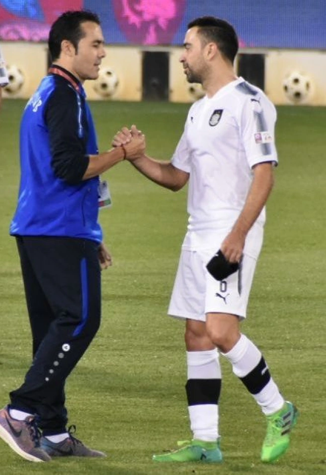 Jorge Peris coincidiendo con el ex del FC Barcelona, Xavi Hernández