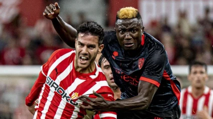 Rober Pier y Patrick Soko en el Sporting - Huesca.