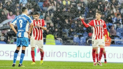 Nacho Méndez junto a Cote en Riazor.