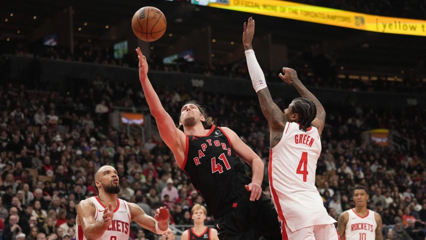 Kelly Olynyk entrando a canasta