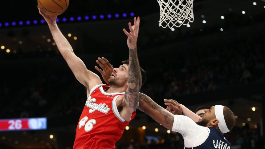 John Konchar y Daniel Gafford