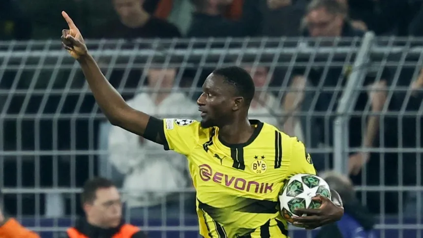 Guirassy celebra su gol de penalti, en el Dortmund - Barcelona