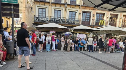 Esperando una silla para el Corpus Christi