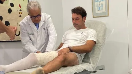 Andy Cartagena junto al doctor Cugat