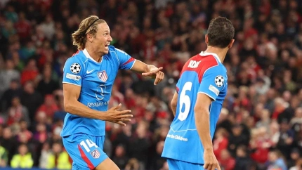 Llorente celebra el 2-2 del Atlético contra el Liverpool