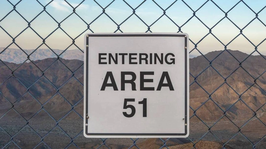 2CCG5F4 2CCG5F4 Entering Area 51 Sign On A Fence At The Military Base In The Nevada Desert At Sunset
