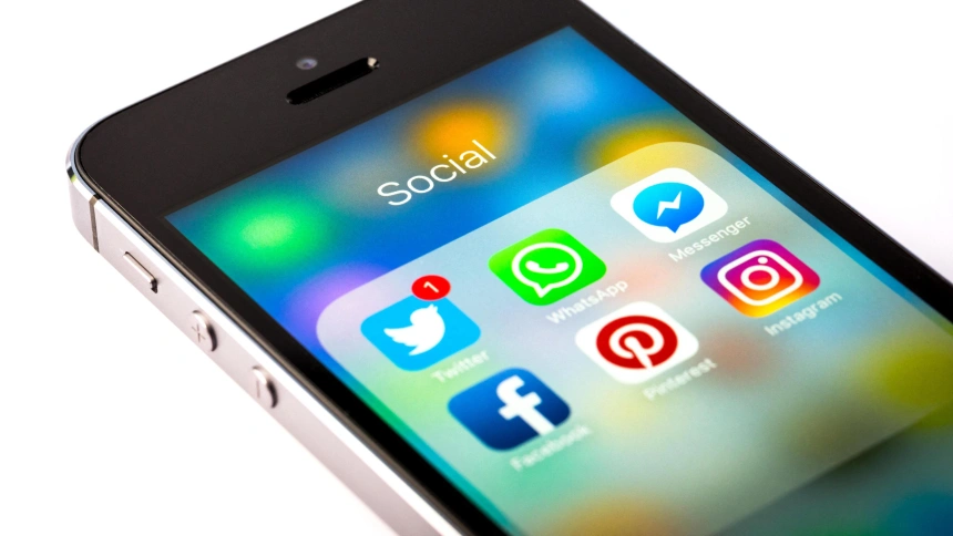 M1X51B selection of social media apps on an iPhone mobile phone