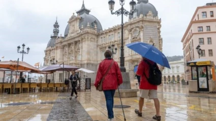 Turistas bajo la lluvia