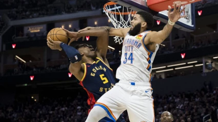 Nov 27, 2024; San Francisco, California, USA;  Oklahoma City Thunder forward Kenrich Williams (34) blocks Golden State Warriors forward Kevon Looney (5) during the third quarter at Chase Center. Mandatory Credit: John Hefti-Imagn Images/Sipa USA *** Local Caption *** 58044753