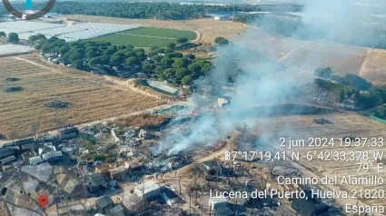 (Foto de ARCHIVO)Imagen del incendio en el asentamiento de Lucena del Puerto (Huelva).PLAN INFOCA03/6/2024