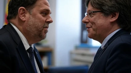 Oriol Junqueras y Carles Puigdemont conversando