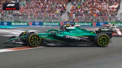 Fernando Alonso, con el Aston Martin en pleno trompo tras recibir el impacto de Lawson.