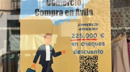 Cartel sobre la campaña de Cheques Comercio Compra en Ávila
