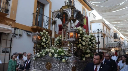La procesión del Corpus a su paso por la calle Corredera de Lorca en una imagen de achivo